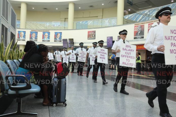 [UPDATED] CAL pilots in placard converse at Piarco World Airport